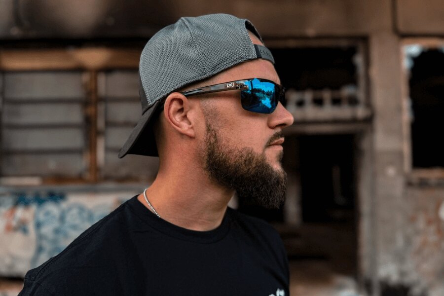 Man wearing Wiley X tactical sunglasses with blue polarized lenses