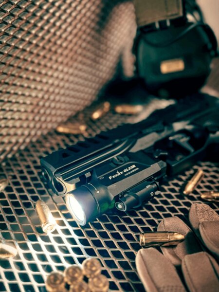 Fenix GL22R tactical LED flashlight mounted on a firearm – ideal for security and defense. Photo: Rigad