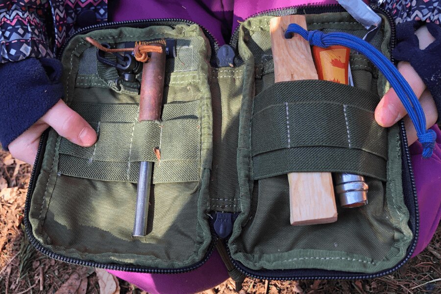 A case with a flint and children's knife Opinel