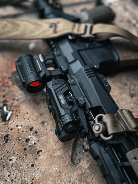 A long firearm fitted with accessories, illustrating changes in firearm registration and the digitalisation of firearms administration under the Firearms Act effective from 2026. Photo: Rigad