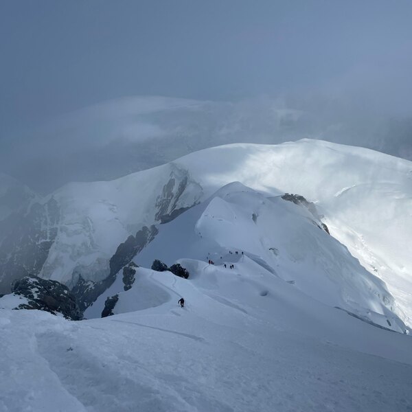 A climber walking along the ridge while climbing Mont Blanc. Photo: Rigad