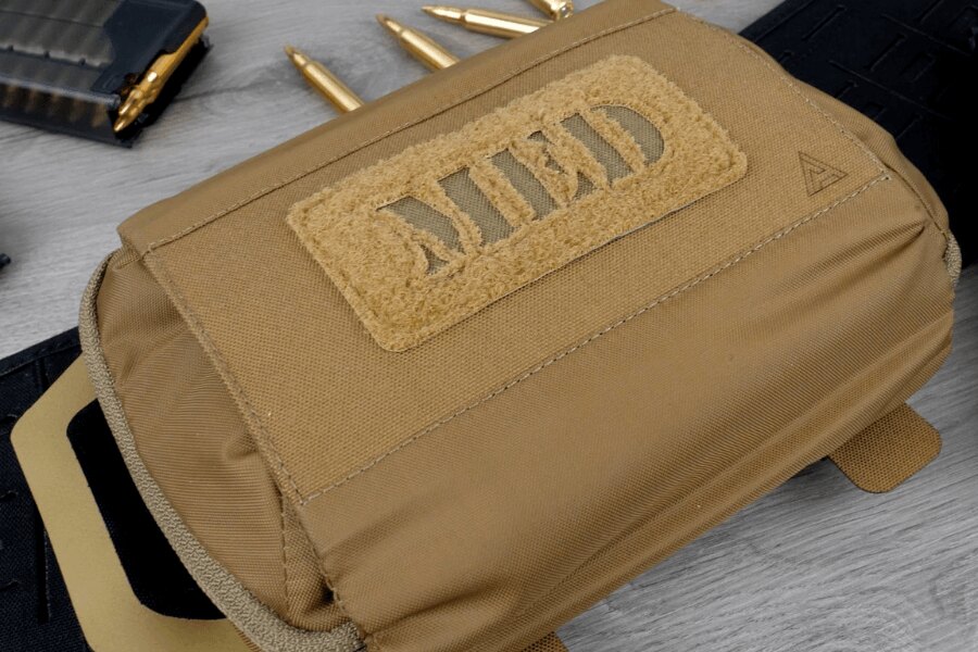 Tactical pouch for first aid kit with prominent MED marking, ready for quick use. Photo: Rigad