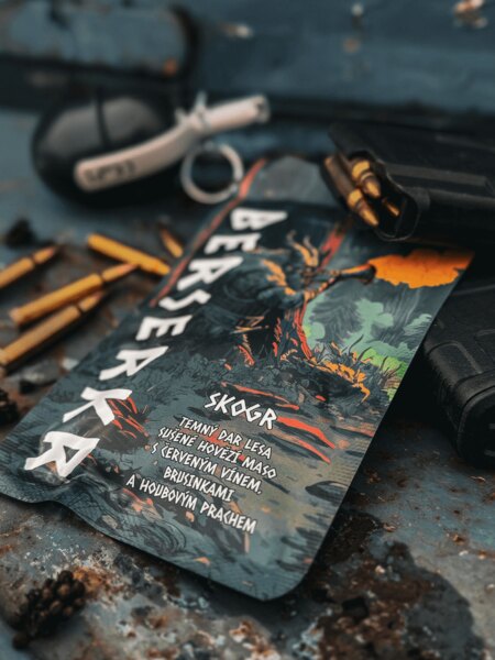 Berserkr SKOGR Forest Spice Blend beef jerky with cranberries, wine, and mushroom powder, photographed alongside ammunition and field equipment.