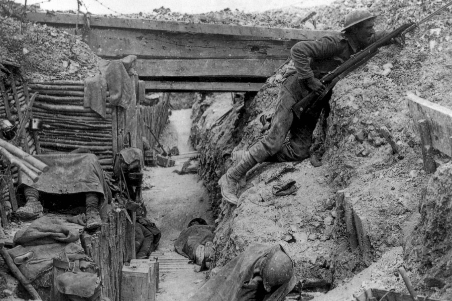 British soldiers in a trench during World War I, illustrating confined conditions and the use of long rifles in close-quarters combat