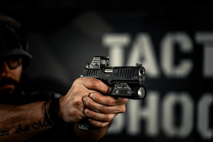 Holosun 407C-X3 red dot sight mounted on a pistol