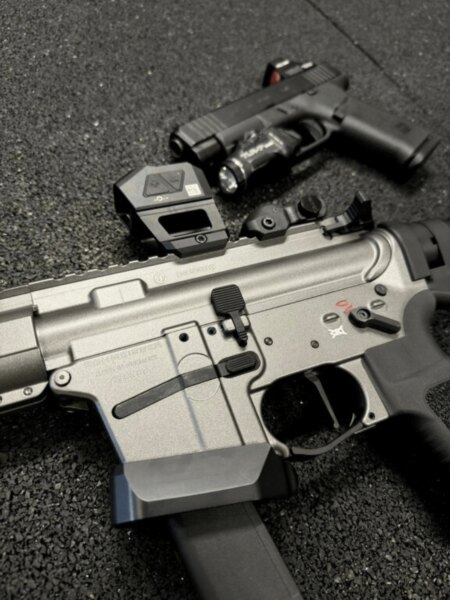 Close-up of the Schmeisser AR15-9 PCC carbine with a Glock-pattern magazine