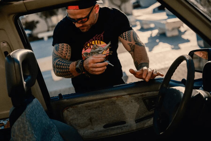 A man wearing a Helikon-Tex T-shirt featuring a BRTTT design inspired by the legendary A-10 Warthog aircraft.