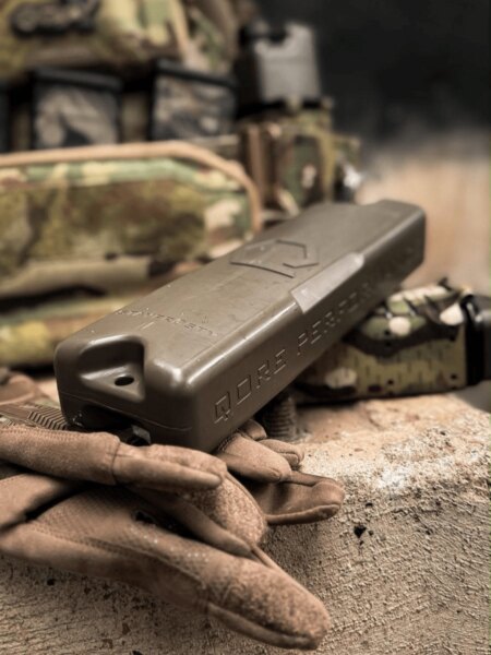 Qore Performance ICEFLASK<sup>&reg;</sup> shaped like a military radio.