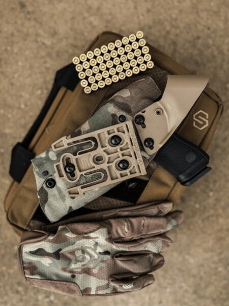 Rear of a Safariland holster fitted with a QLS 19 quick-detach locking fork.