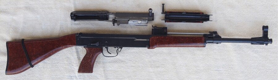 Partially field-stripped Sa vz. 58 P with its bolt assembly and receiver cover removed.
