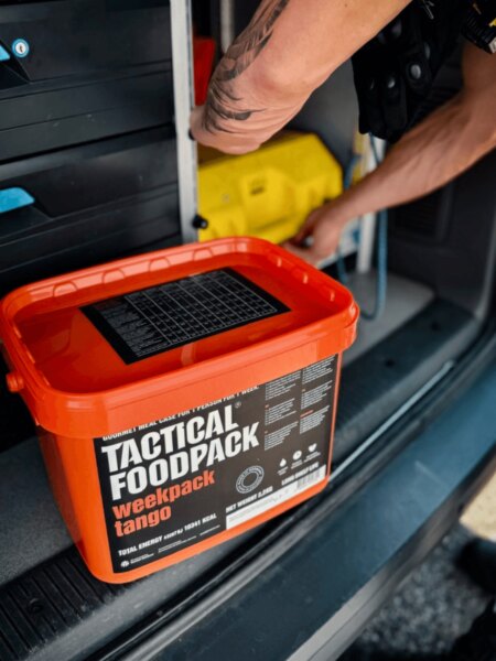 Tactical Foodpack food supply stored in the trunk of a vehicle.