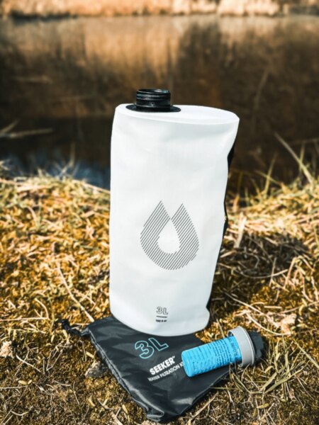 A 3-litre HydraPak Seeker collapsible water container with a filter cartridge.