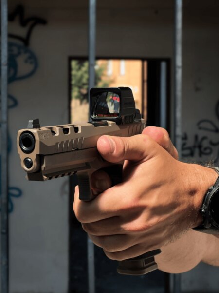 Front view of the SIG Sauer P320 DH3 pistol with a Holosun open collimator.