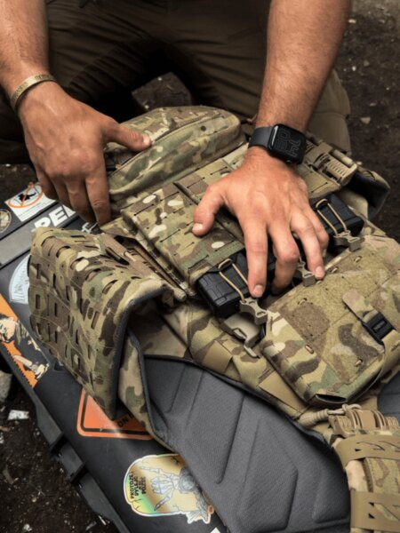 Close-up of the front panel being handled on a Templar’s Gear CIBV3 4EL plate carrier.