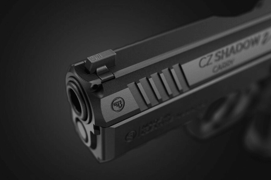 Close-up of the muzzle, front sight and forward slide serrations of the CZ Shadow 2 Carry pistol.