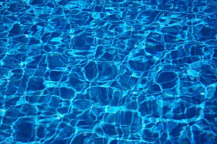 A view of water in a blue pool