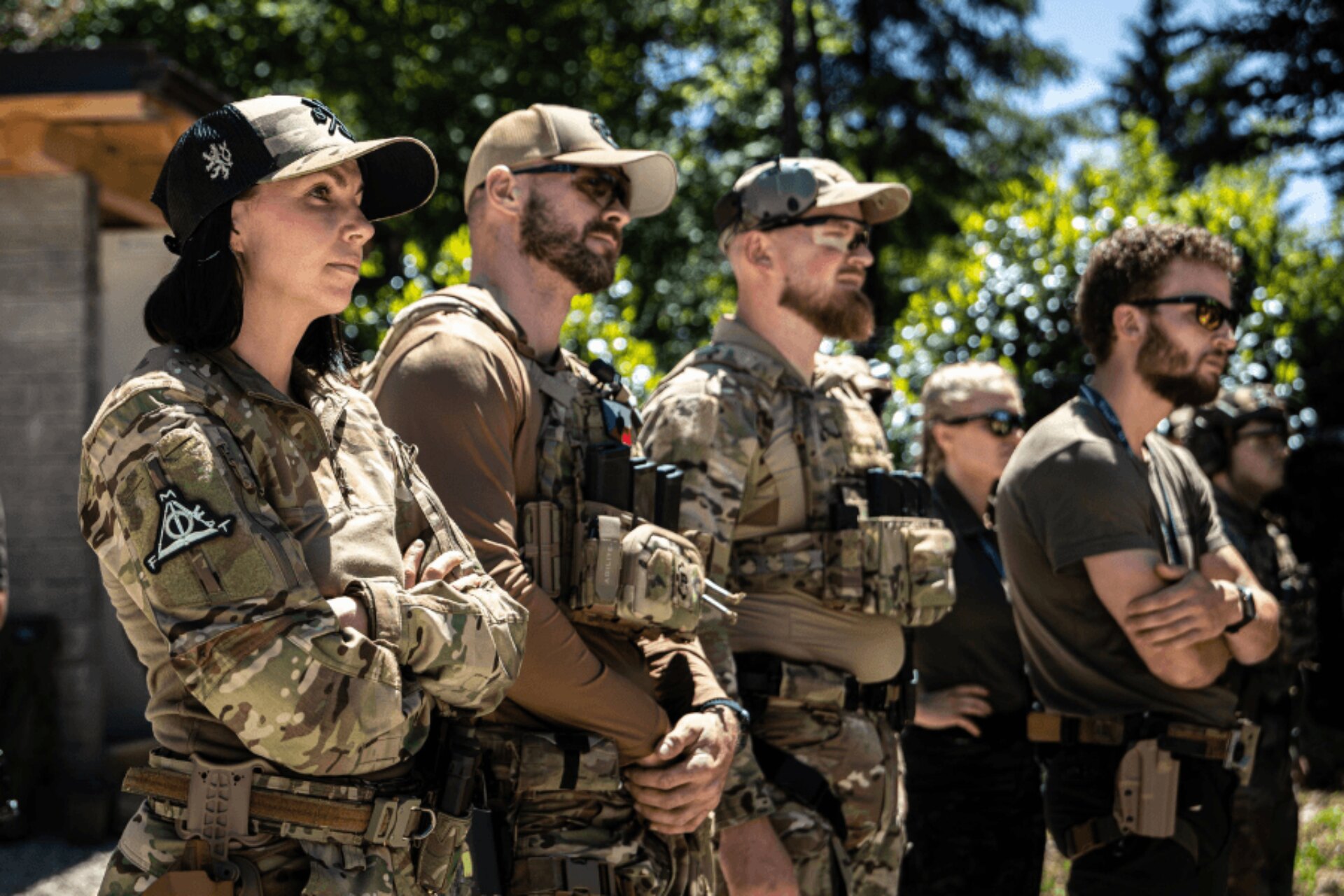 Participants listening to a stage briefing before the start of a Lynx Brutality challenge.