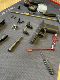Professional cleaning (ultrasonically) and lubrication of short firearms